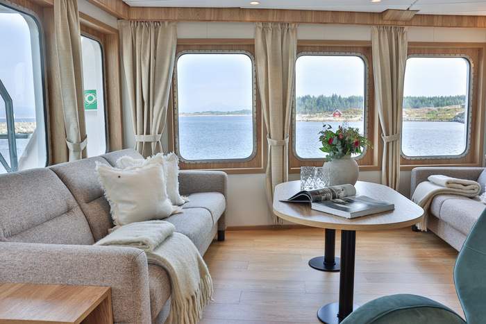 MV Vikingfjord Lounge Sofa and Coffee Table Stern View Secret Atlas.jpg